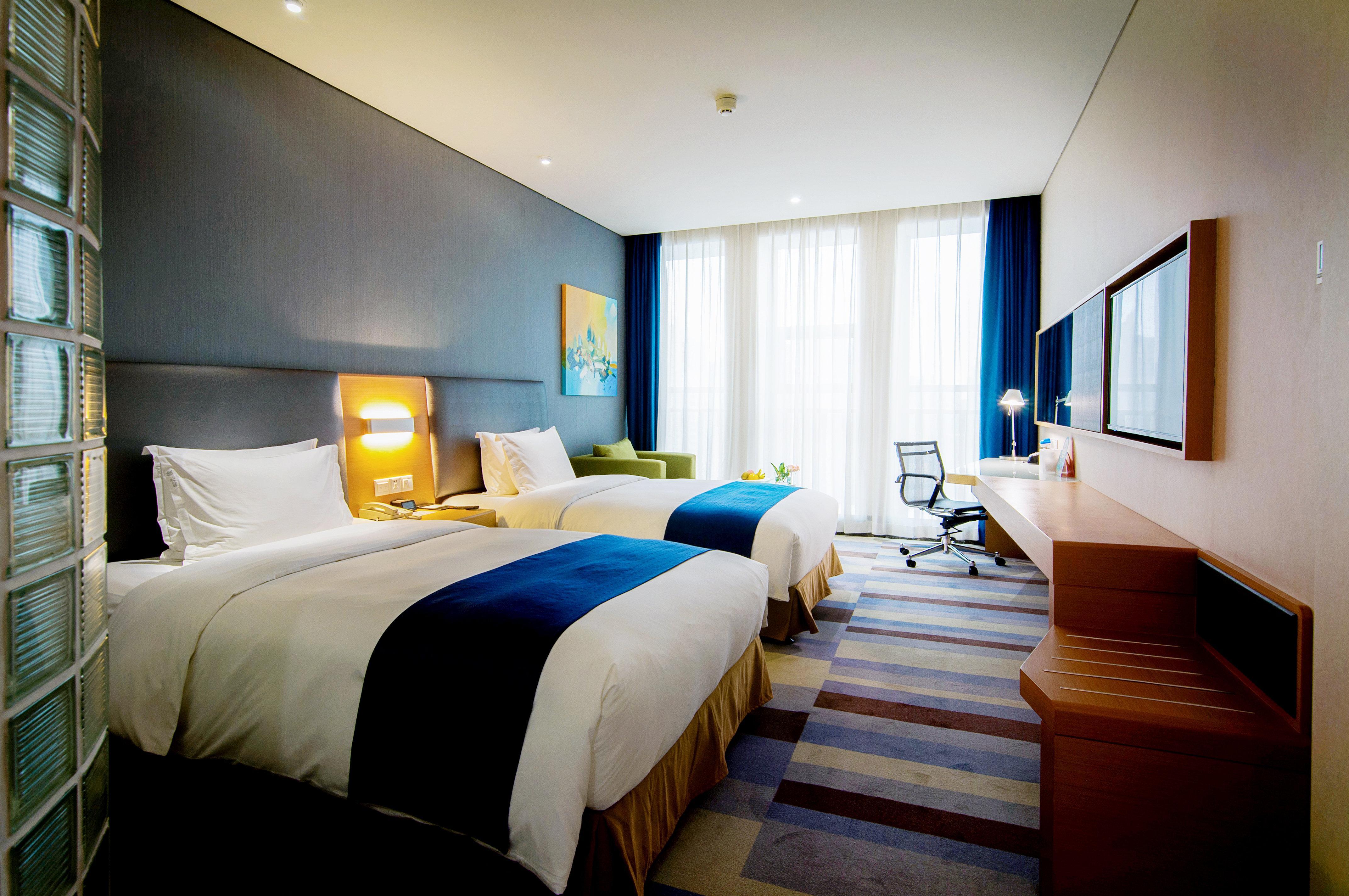 Holiday Inn Express Leshan City Square By Ihg High Speed Rail And Leshan Giant Buddha מראה חיצוני תמונה
